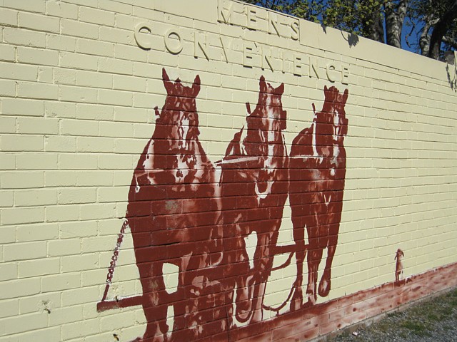 Team of Horses Ploughing - on the wall of the 'Mens Convenience'